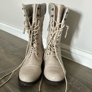 Beige boots; worn a few times. Inside zipper to fit foot in and outside pocket